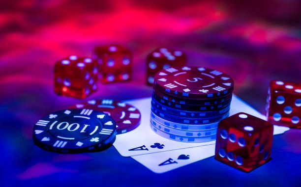 Casino abstract photo. Poker game on red background. Theme of gambling. Play Slot Gacor Games Anytime, Anywhere